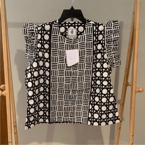 Sue sartorial Fairfield flounce top